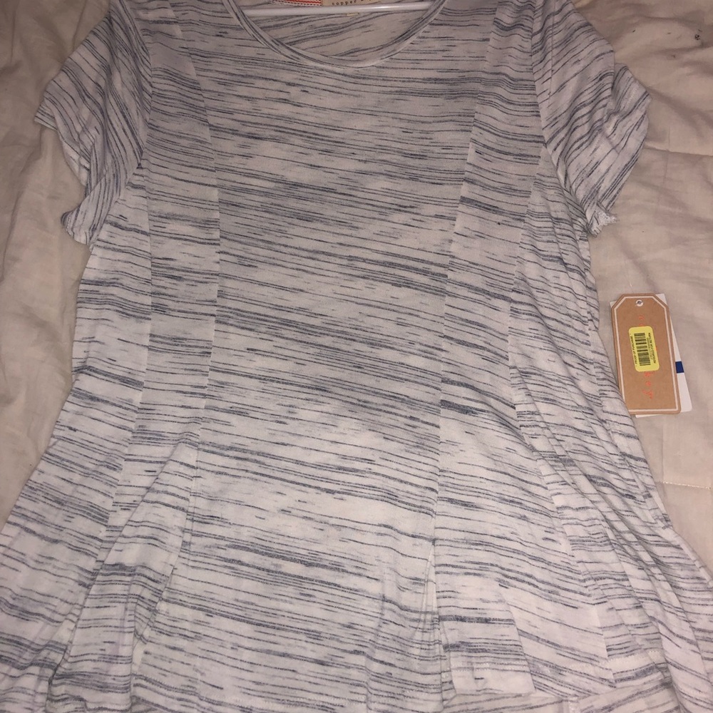 a white and navy abstract striped shirt